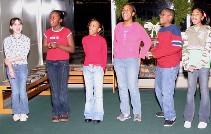 Six choir members practicing