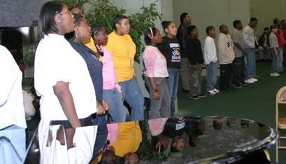 Large choir practicing. 