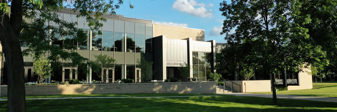 Photo of Gloria Coles Flint Public Library from front in Spring