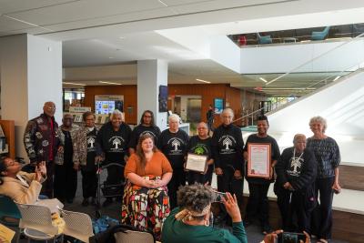 Photo of Flint African American Quilters Guild holding Michigan Heritage Award