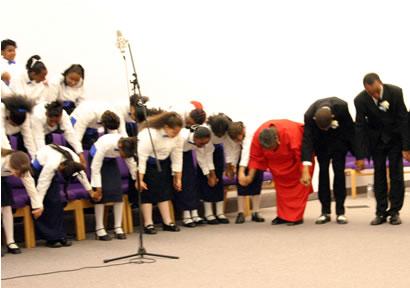 Choir taking bow.